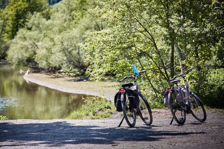 Two bikes on a riverbank